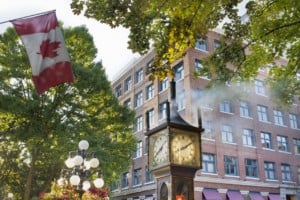 Steam Clock at Gastown Vancouver BC Canada surrounded by Maple trees